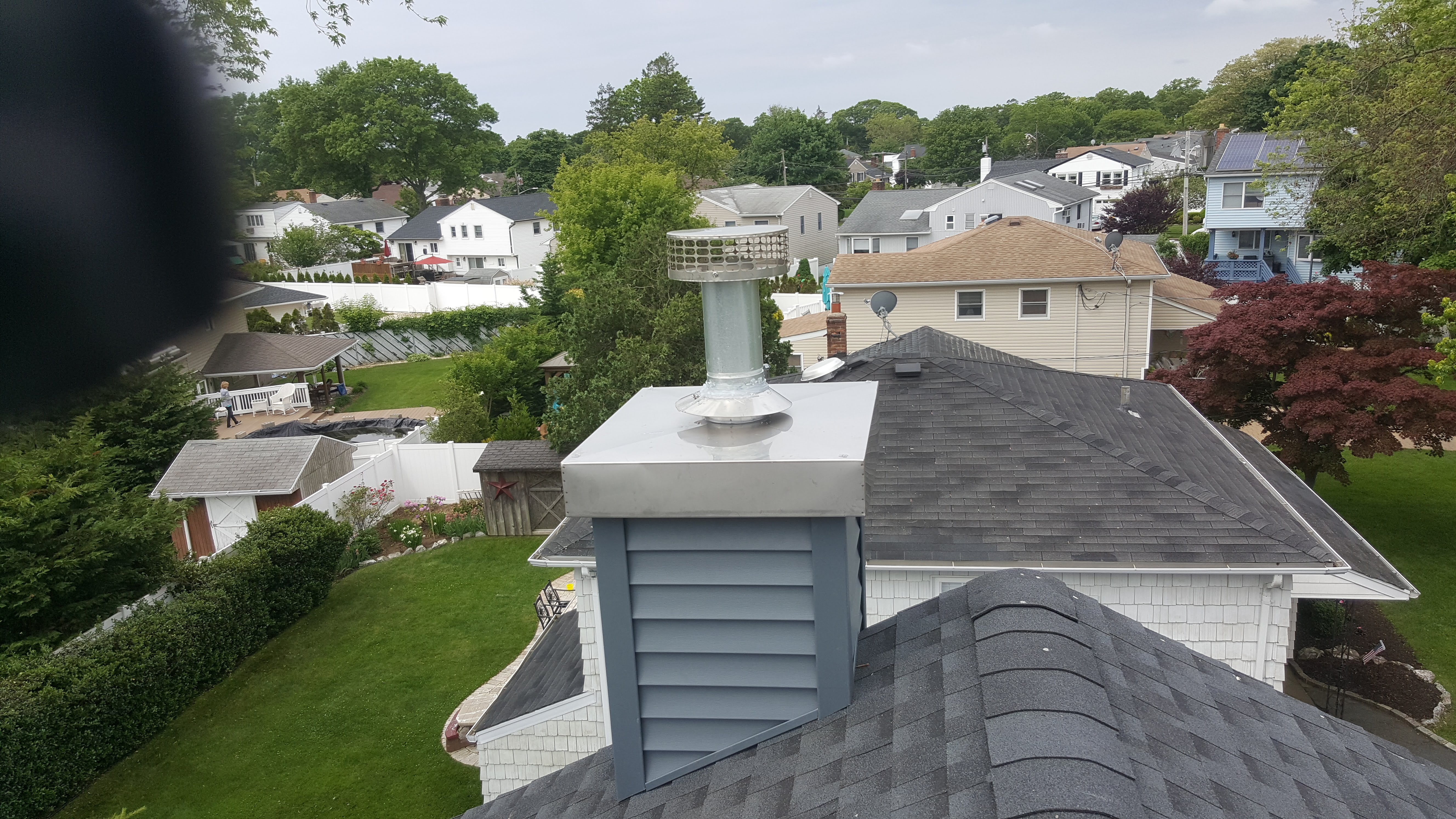Complete chimney crown rebuild and waterproofing in Elmont, New York